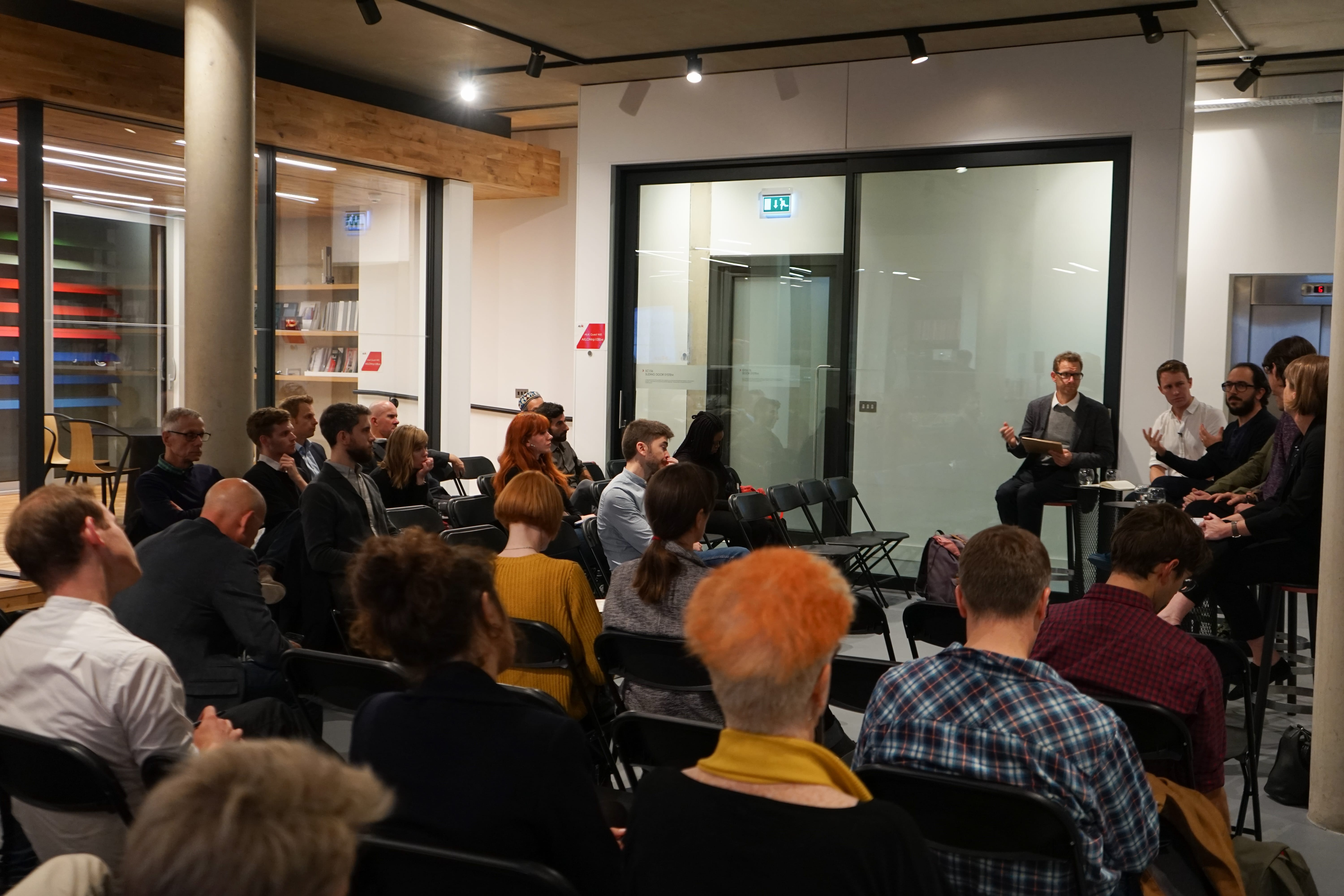 Guests listening to the speakers at the AluK and Architecture Today Event 